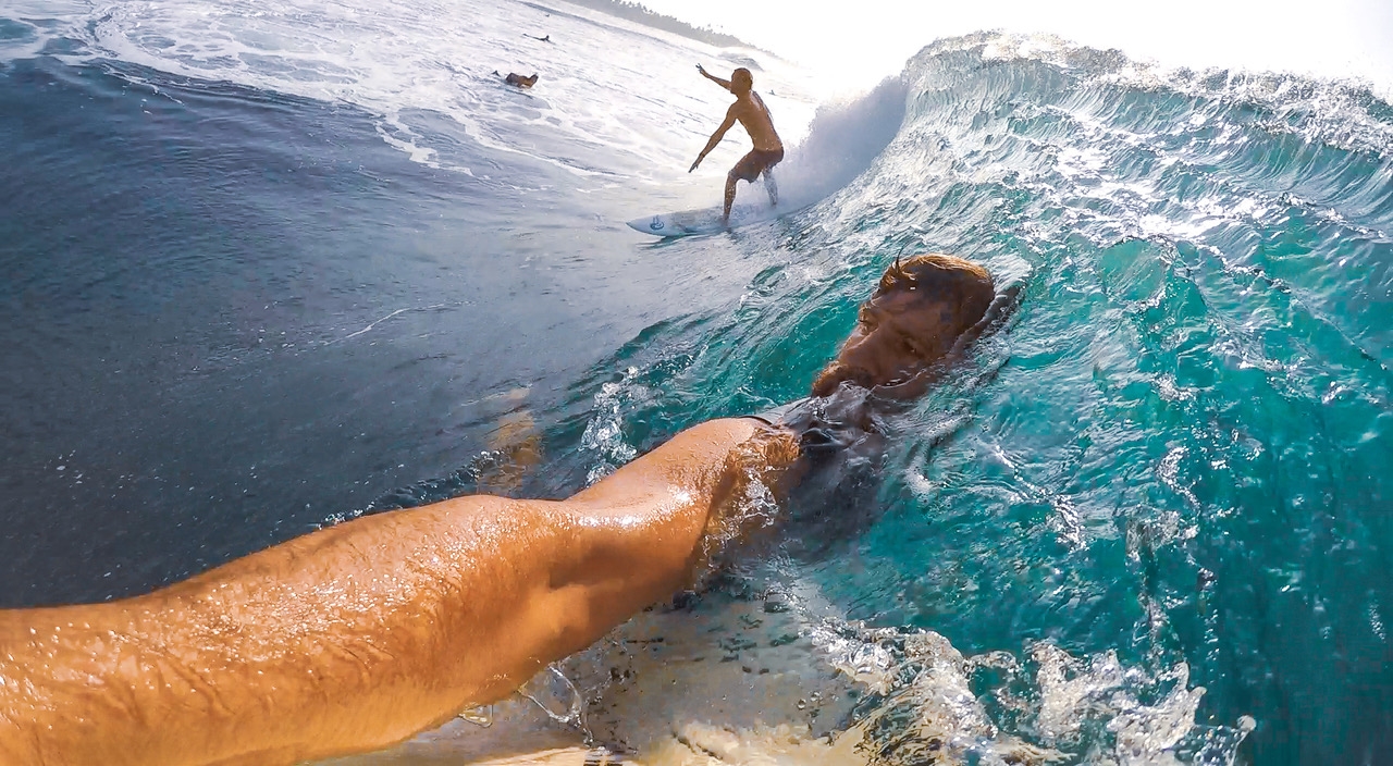 Surfing at Midigama